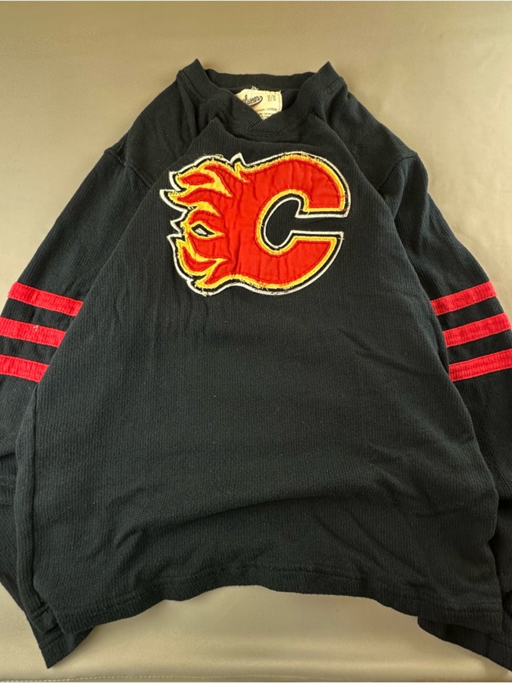 Men's Black Crewneck Sweater with Red Calgary C Flame Patch